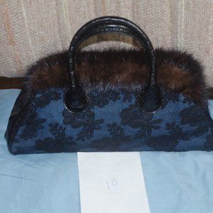 LIKE NEW CLEVER CARRIAGE COMPANY HAND BAG- BLUE WITH BLACK AND FUR ON TOP